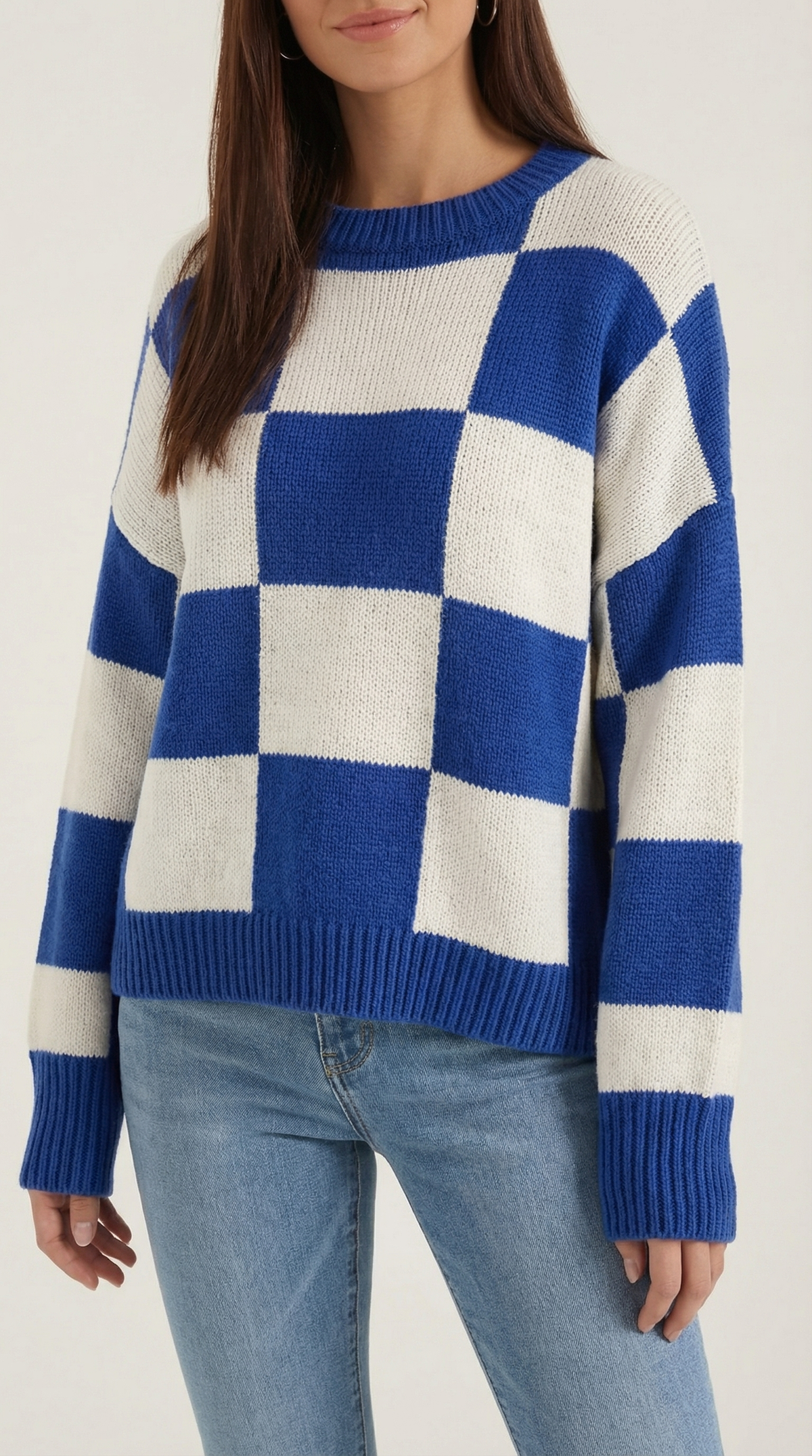 Knitted sweater with a plaid design