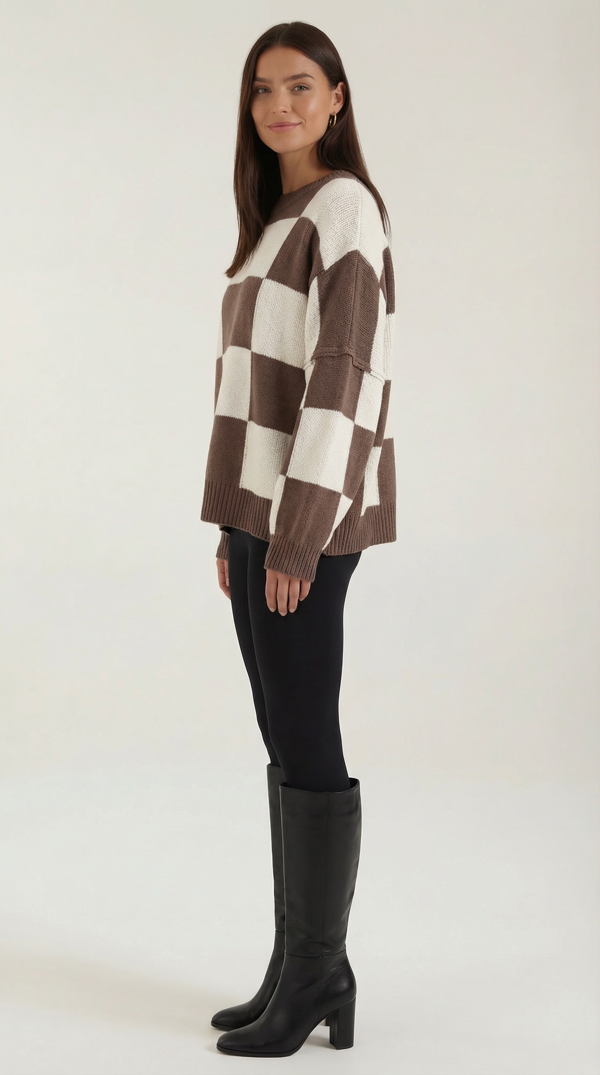 Knitted sweater with a plaid design