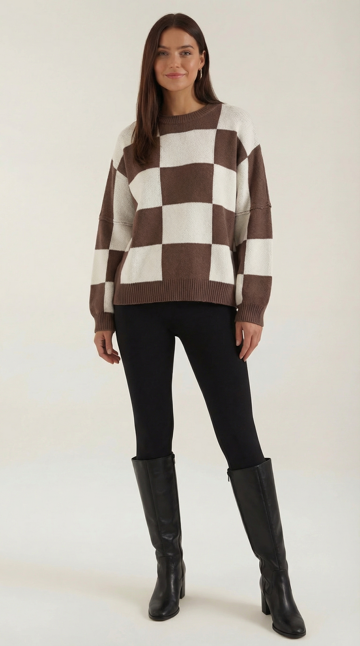 Knitted sweater with a plaid design