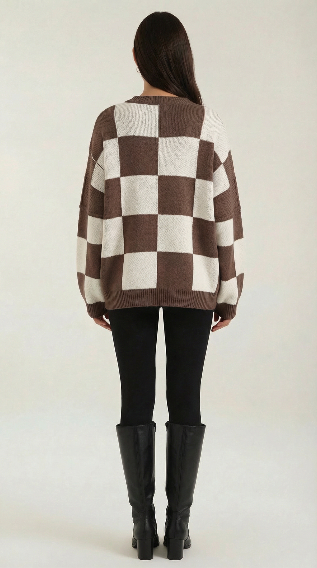 Knitted sweater with a plaid design