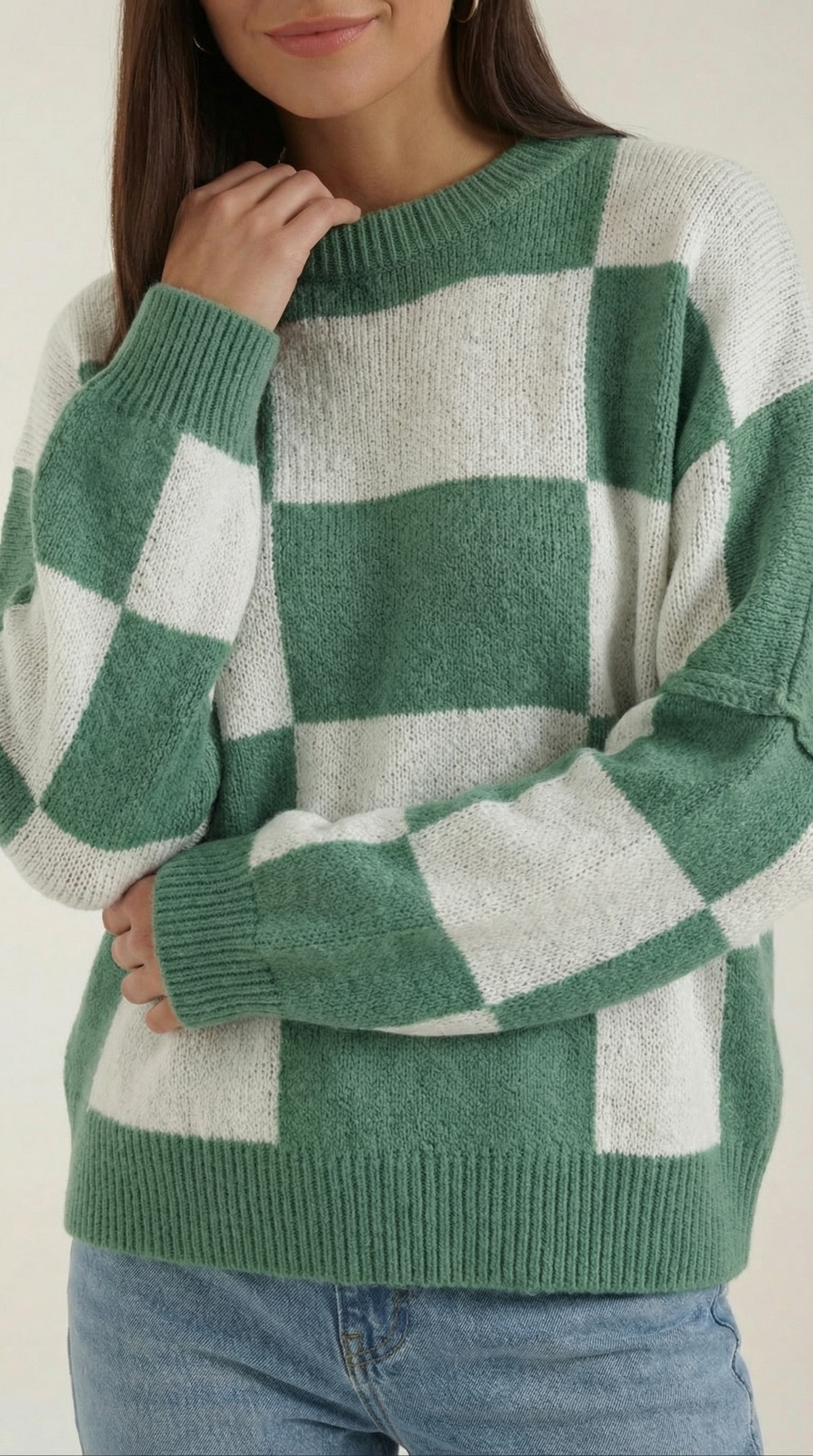 Knitted sweater with a plaid design