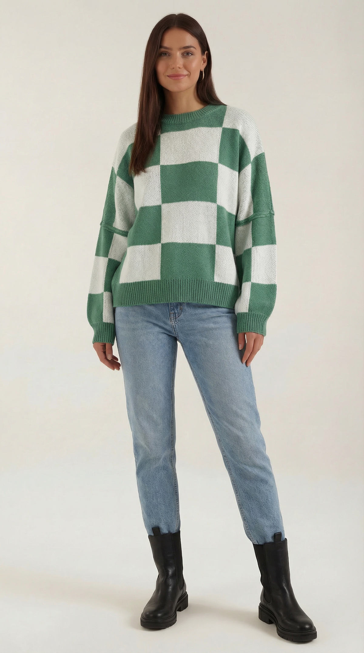 Knitted sweater with a plaid design