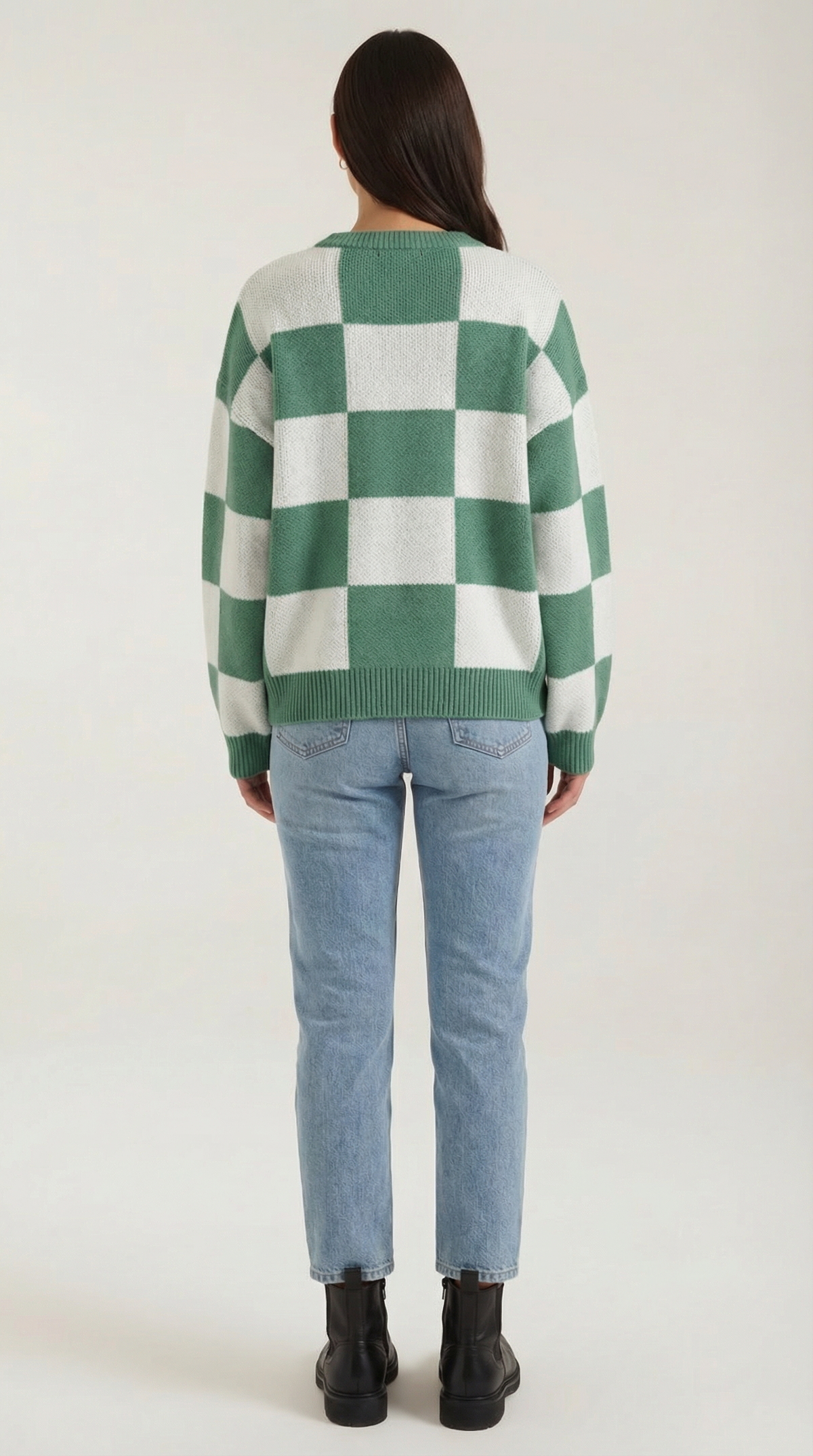 Knitted sweater with a plaid design