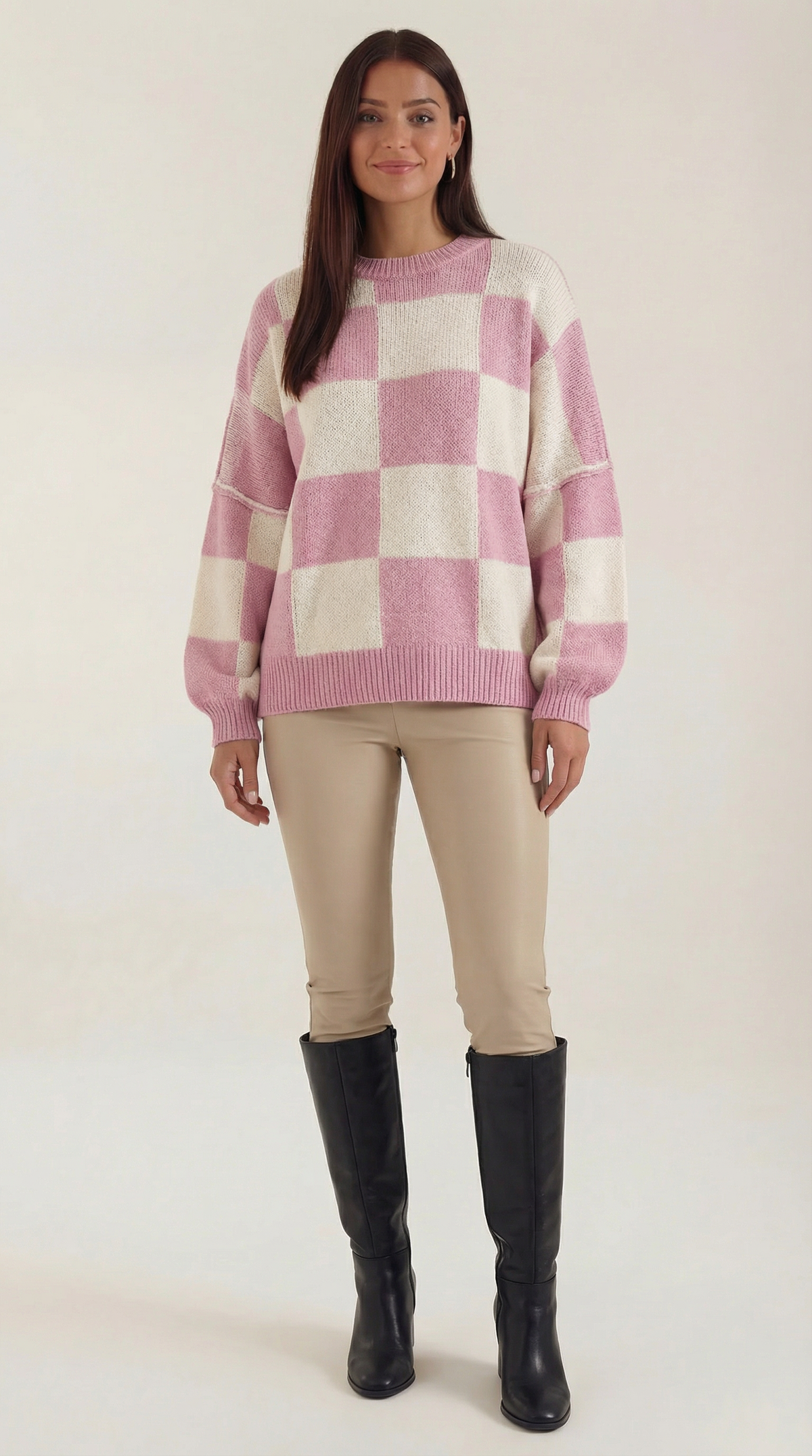 Knitted sweater with a plaid design