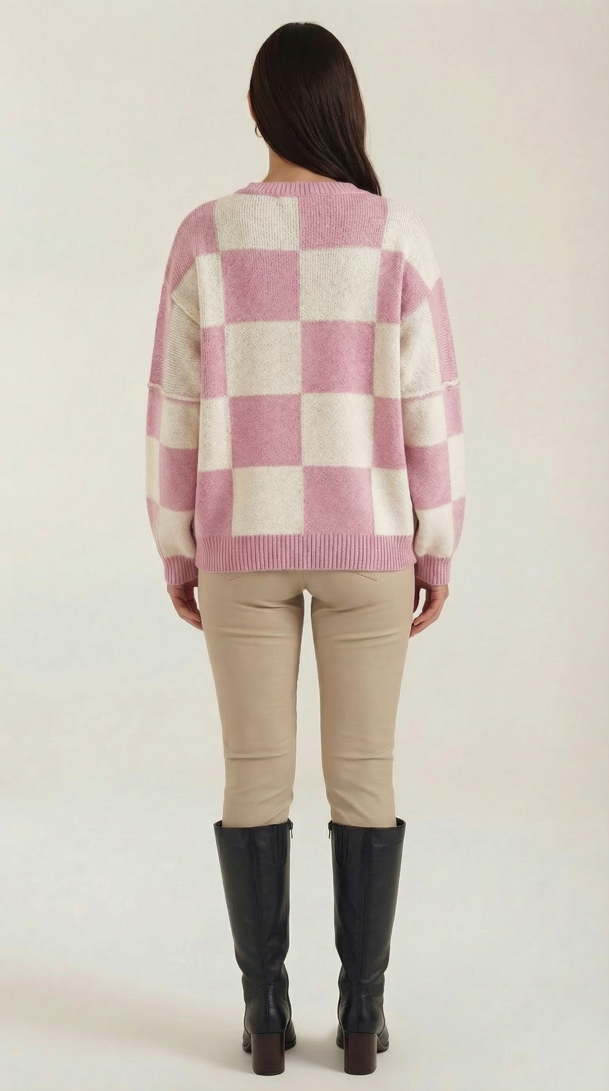 Knitted sweater with a plaid design