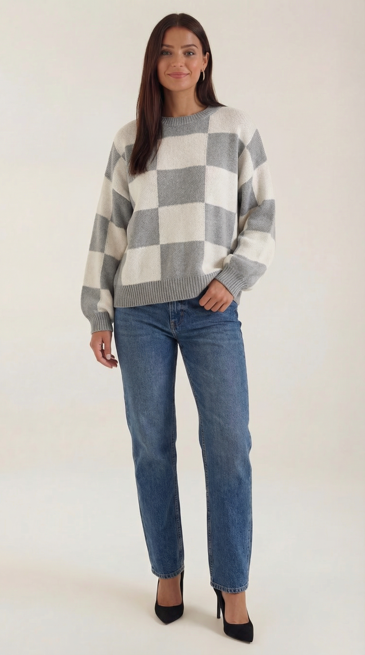 Knitted sweater with a plaid design