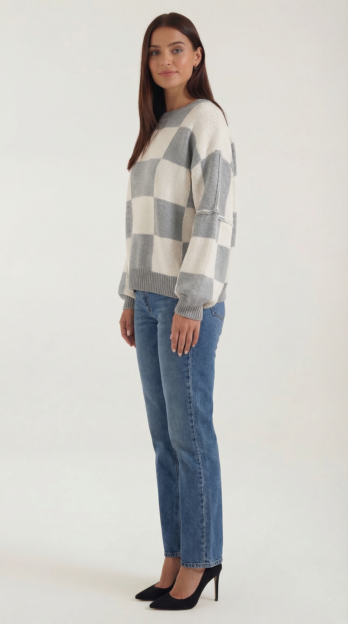 Knitted sweater with a plaid design