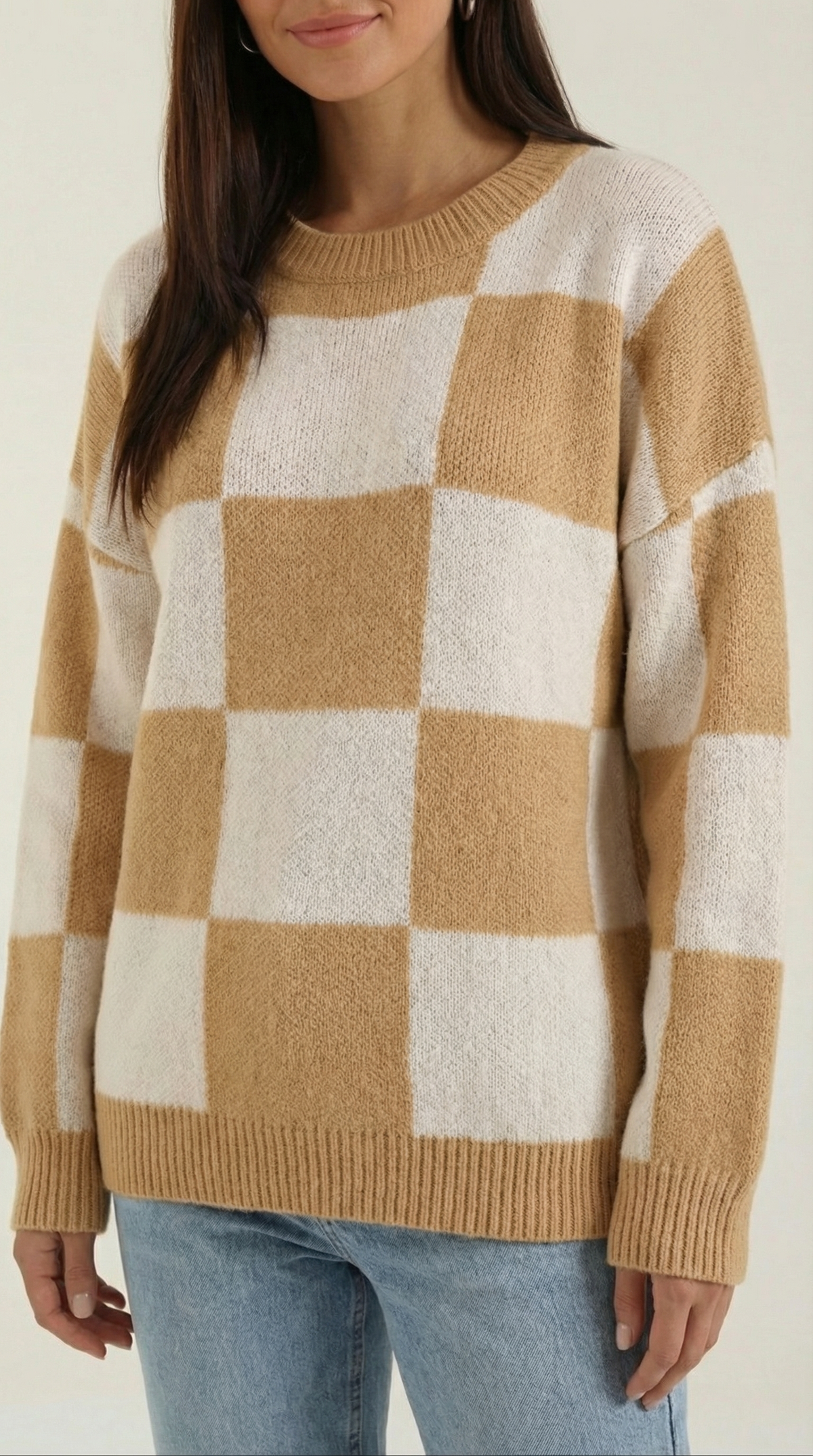 Knitted sweater with a plaid design