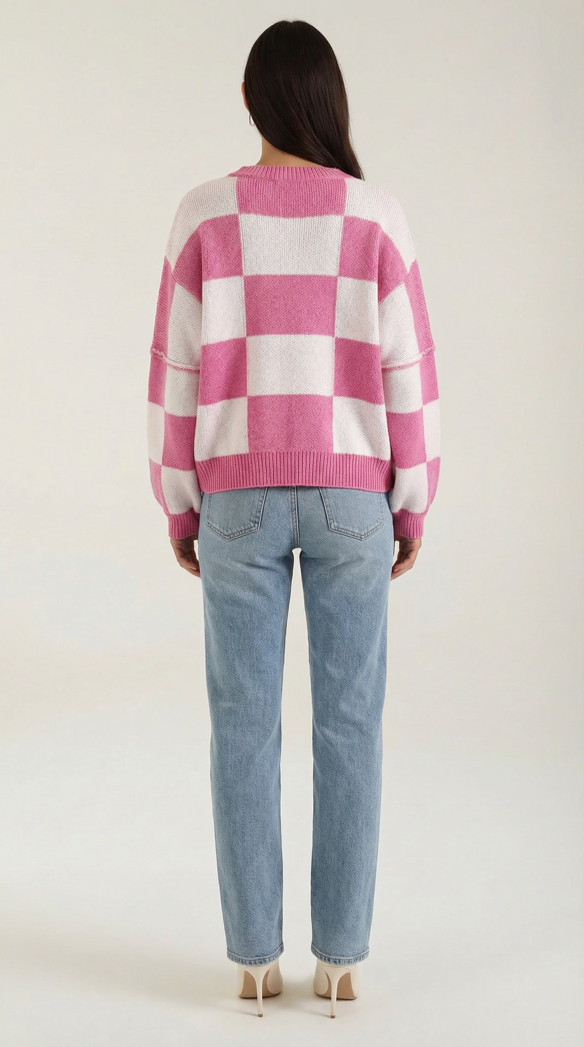 Knitted sweater with a plaid design