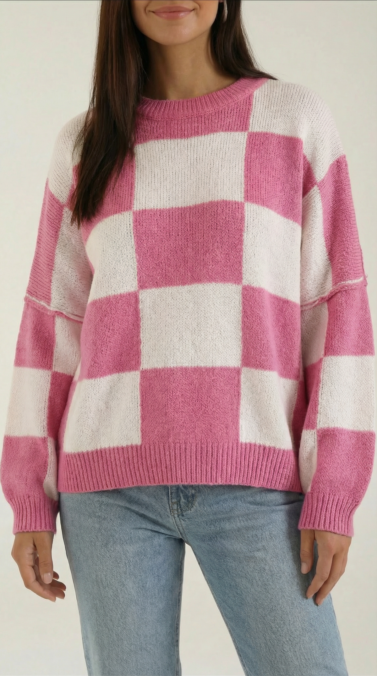 Knitted sweater with a plaid design