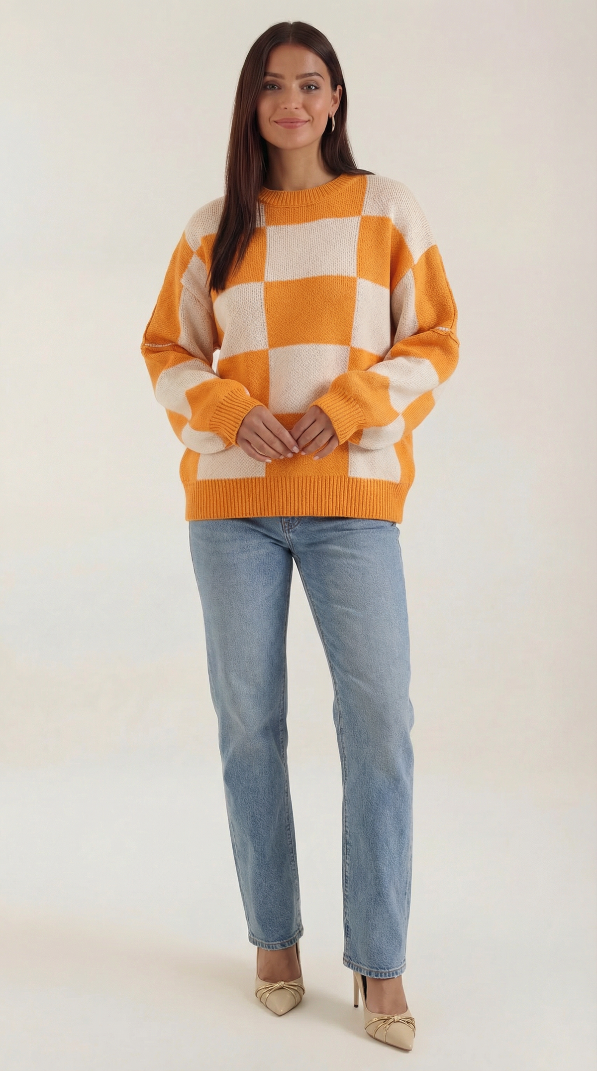 Knitted sweater with a plaid design