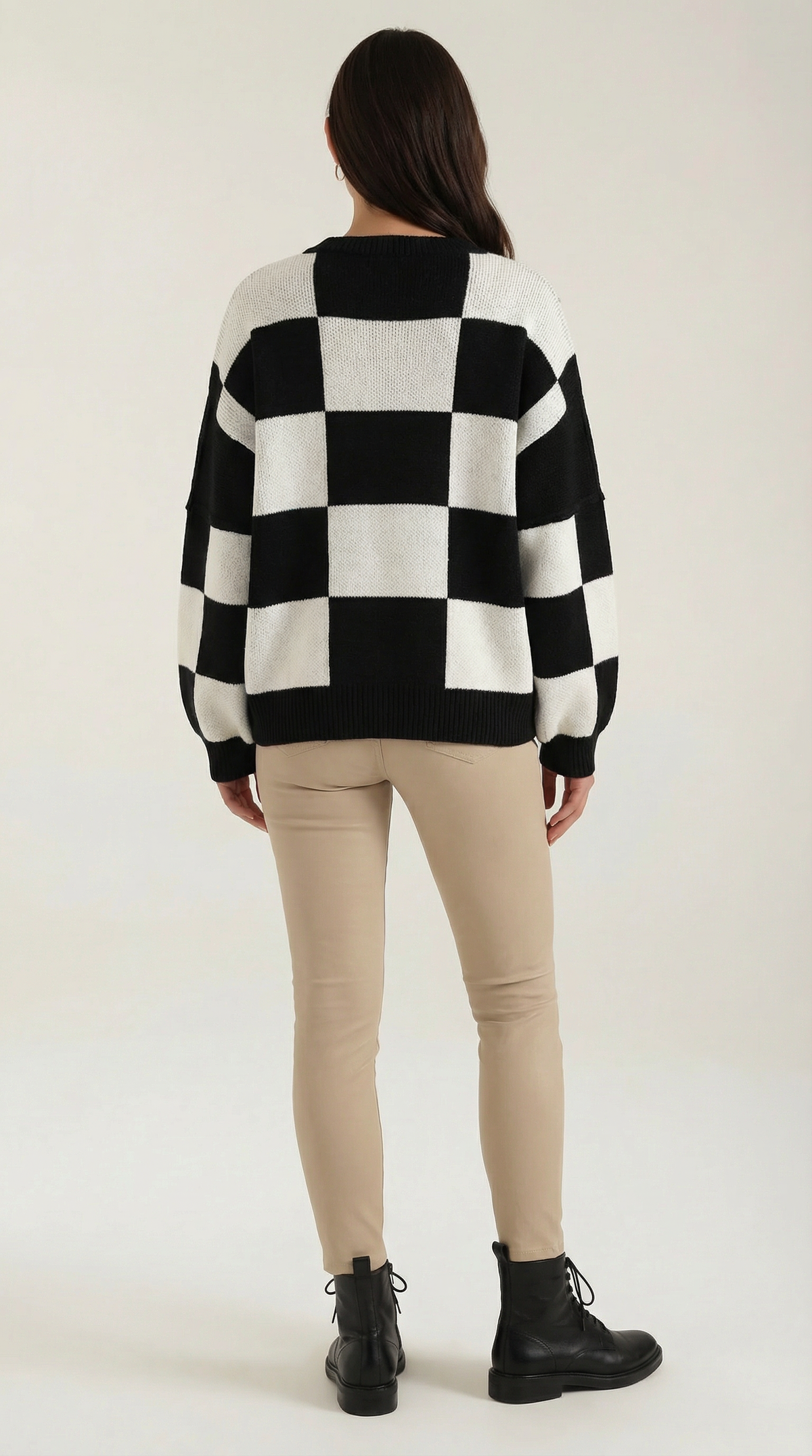 Knitted sweater with a plaid design